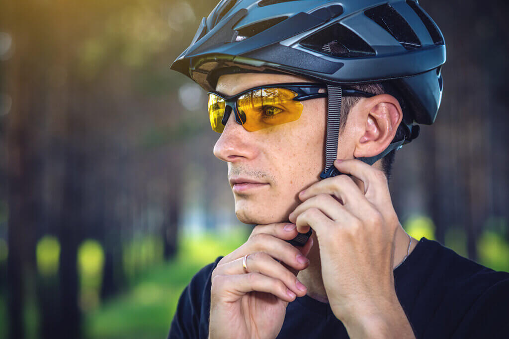 cyclist wears a sport helmet
