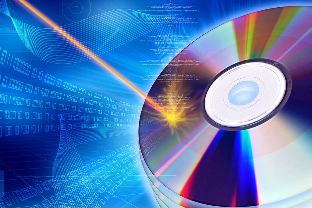 Laser beam writes data to a blank DVD disc