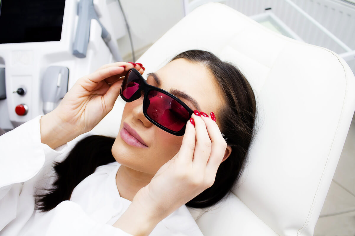  Woman in the treatment room for professional hair removal