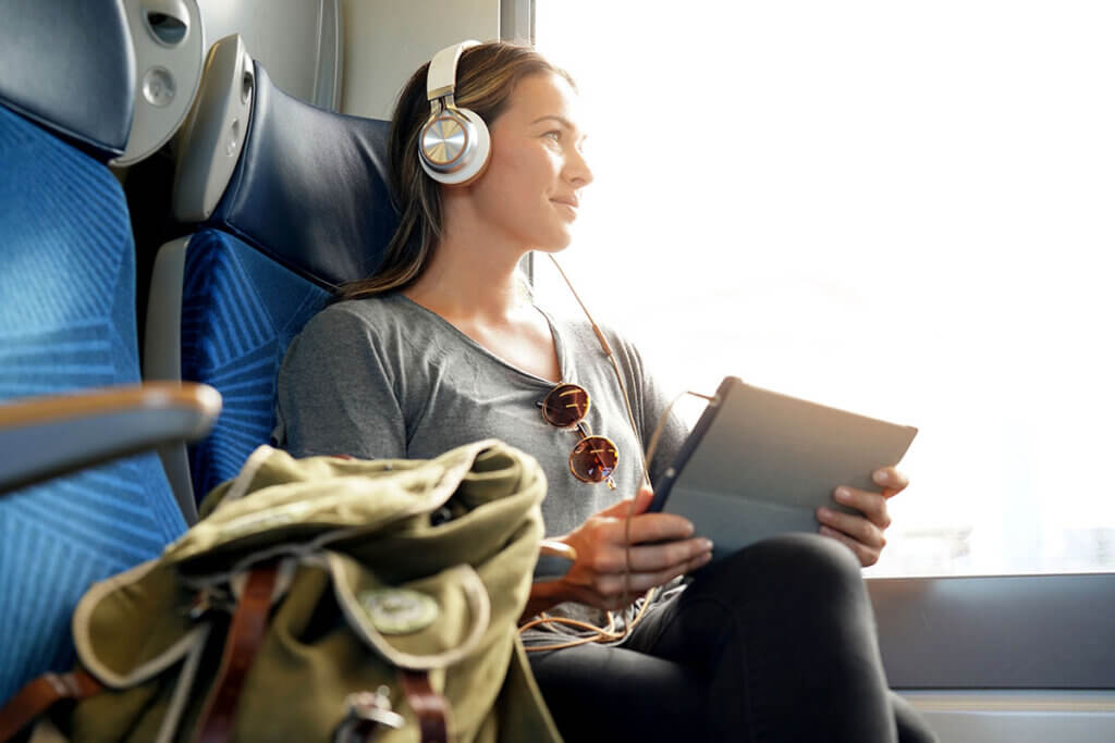 woman in train hears music