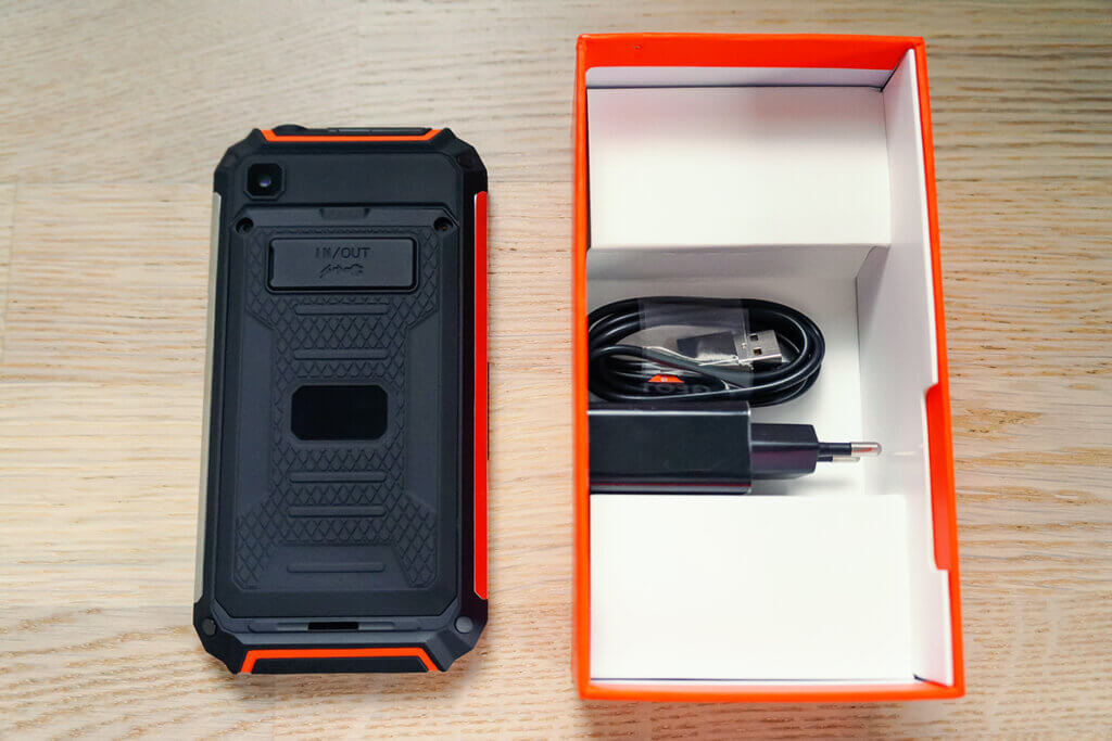 unpacked outdoor smartphone next to packaging