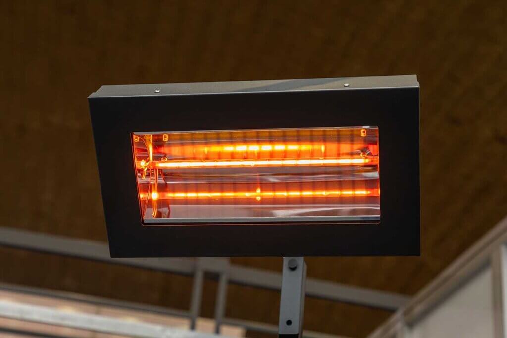 An electric infrared radiant heater provides direct heat.
