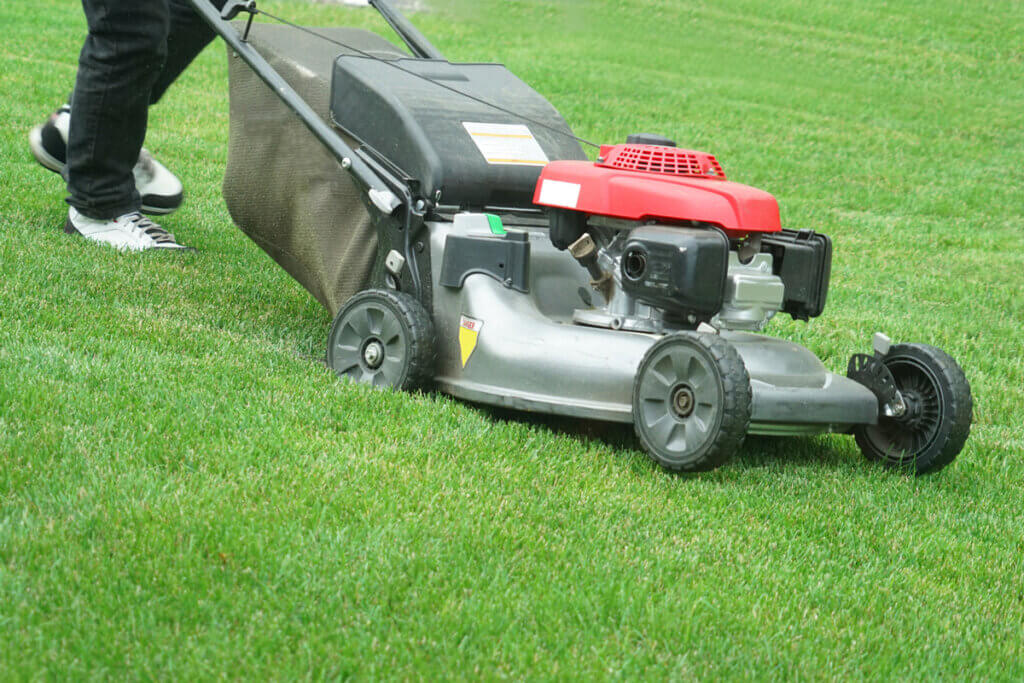 side view of a lawn mower when mowing
